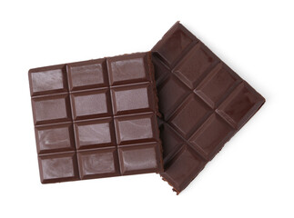 Pieces of delicious dark chocolate bar isolated on white, top view