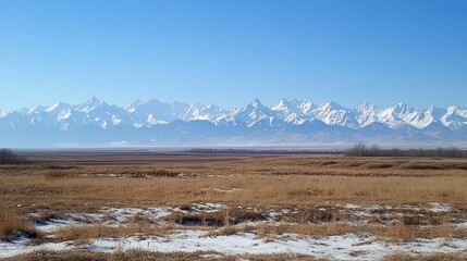 Majestic Snow-Capped Mountains and Vast Plains