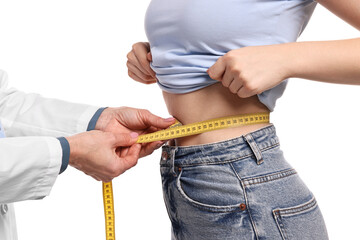 Weight loss. Nutritionist measuring patient's waist with tape on white background, closeup