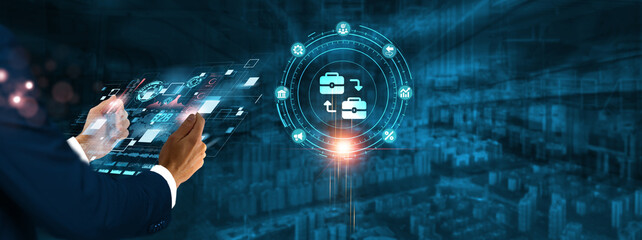 B2B (Business to Business): Businessman holding virtual interface panel of digital device on global networking, partnerships, collaboration, e-commerce, and enterprise technology in futuristic.