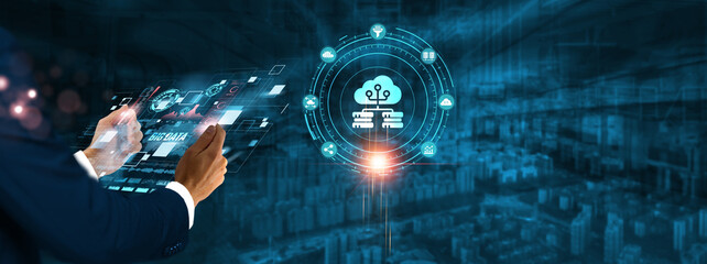 Big Data: Businessman holding virtual interface panel of digital device on global networking, data analytics, insights, cloud computing, scalability, and big data technology in futuristic.