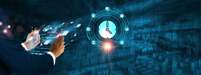 Time Management: Businessman holding virtual interface panel of digital device on global networking, productivity, scheduling, organization, prioritization, and automation technology in futuristic.