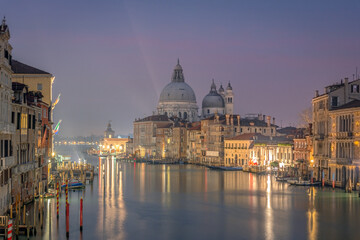 28 November 2015 Venice, italy, Canal grande with historical houses, gondole traditional boats and st may of health Basilica in background