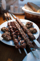 Mixed meat grill dinner, meatball and bread