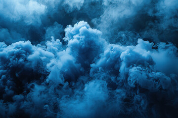 Fototapeta premium Blue smoke envelops the area as a smoke bomb produces vibrant plumes, enhancing the mood of an outdoor event during the evening hours, captivating onlookers with its striking contrast.