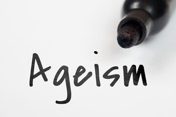Ageism inscription on paper meaning background