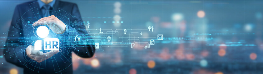 Businessman holding HR strategy plan, employee performance data, leadership development tools,...