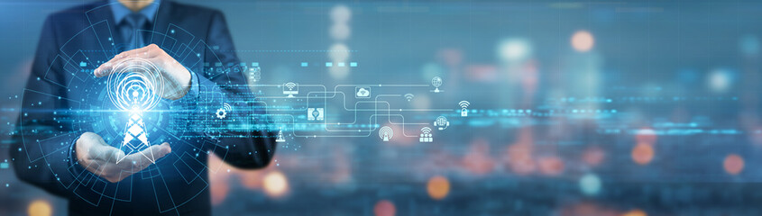 Businessman holding telecommunications equipment, mobile network devices, digital communications,...