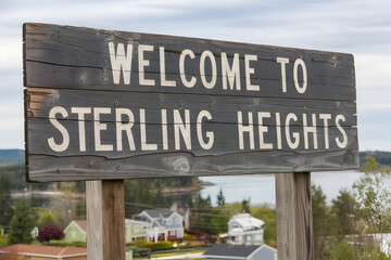 Welcome to Sterling Heights Michigan Wooden Sign with Rustic Charm and State Pride in the United States