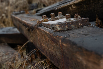 Pile of old discarded wooden railway sleepers