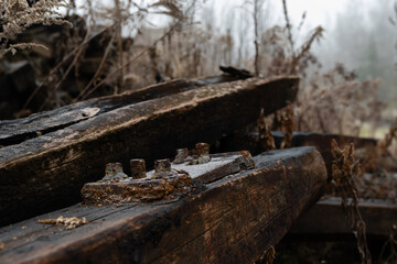 Pile of old discarded wooden railway sleepers