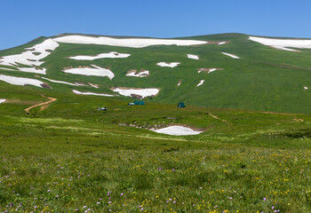 the beginning of the spring period in mountainous areas, remnants of snow cover and panoramic views...