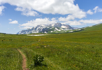 the beginning of the spring period in mountainous areas, remnants of snow cover and panoramic views...
