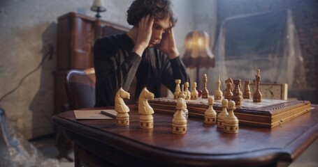 Tense Chess Game A Players Dilemma in a Dimly Lit Room Filled with Anticipation and Pressure