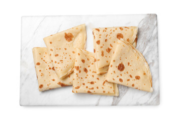 Delicious folded crepes isolated on white, top view