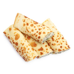 Tasty rolled crepes with cottage cheese and spinach isolated on white, top view