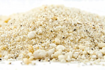 Close up view of a pile of beige sand grains
