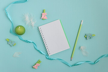 A pastel Easter scene featuring a bouquet of pink tulips adorned with a delicate blue ribbon, a...