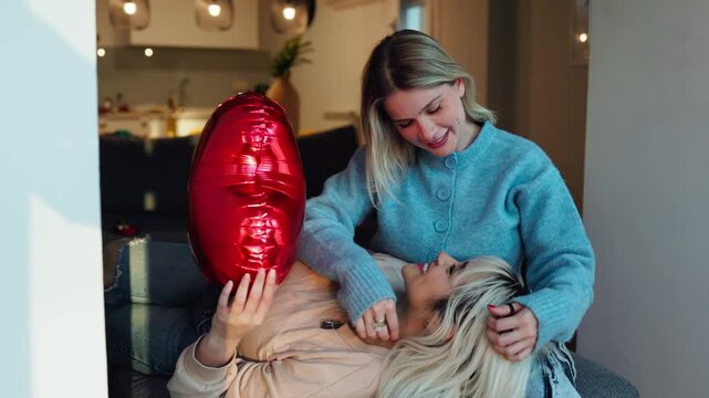 Loving couple celebrating valentine's day at home