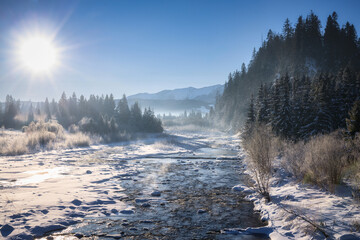 Beautiful landscape of frozen Bialka river at winter. Poland