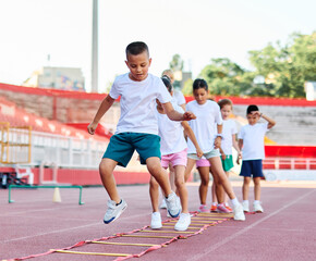 child sport athlete childhood girl competition fun young outdoor active exercise kid running fitness training athletic game healthy group play team school exercising jump