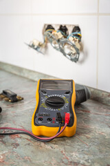 Fixing and repairing broken outlets and socket with tools and ammeter