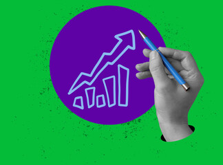 Hand drawing a rising chart. Financial growth and business planning.