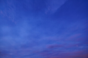 starry sky and clouds at dawn as abstract background