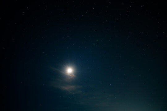 starry sky and moon at night as an abstract background
