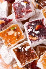 Sweet food Turkish delight, assorted rahat locum in form of cubes with nuts and powdered sugar, traditional food