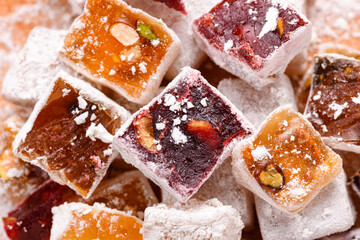 Sweet food Turkish delight, assorted rahat locum in form of cubes with nuts and powdered sugar, traditional food