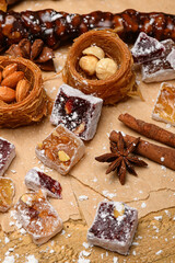 Sweet food Turkish delight on wooden background, assorted locum and candy for decorated backdrop