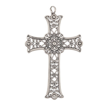 Intricate filigree silver cross on white background