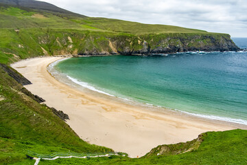 Silver Strand, a beach in a sheltered, horseshoe-shaped bay, situated at Malin Beg, near...