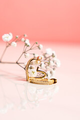 Close up of a gold earring