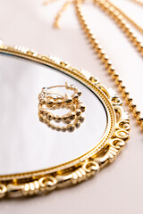 Close up of a gold earring