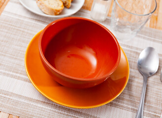 Plate or bowl for soup and cutlery on a holiday table