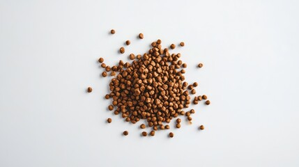 Close-up of a small pile of brown, round granules on a white background.