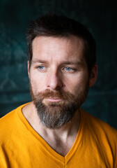 Fototapeta premium handsome man portrait on a dark background