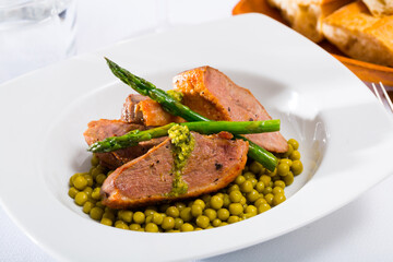 Duck breast with green pea and asparagus
