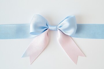 Naklejka premium Elegant blue and pink ribbon bow on white background for gift presentation or decor