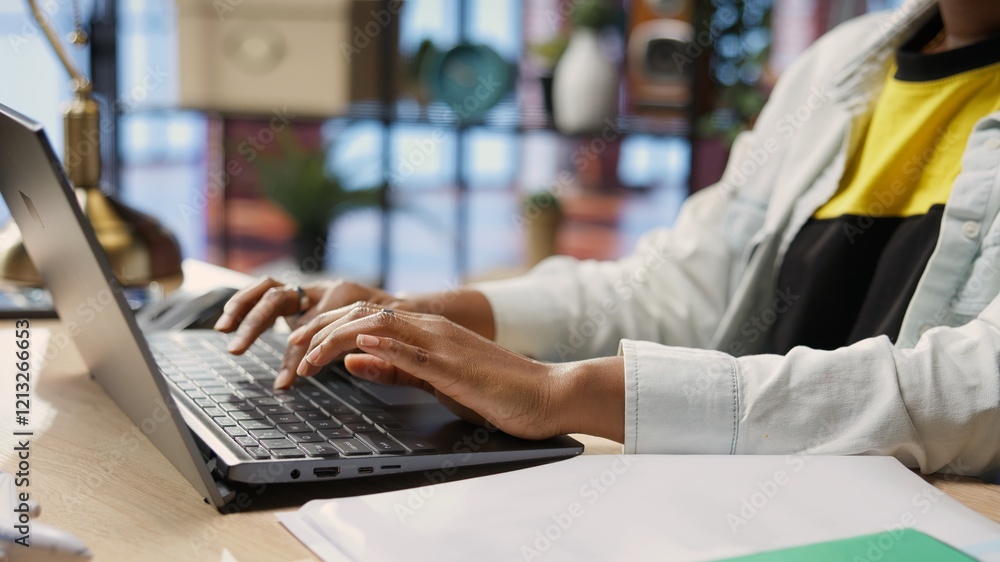 Poster teleworker typing on notebook keyboard in home office to write emails. remote worker using laptop, c