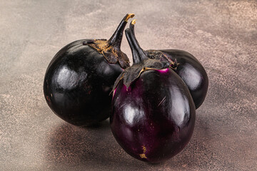 Raw violet and black eggplant