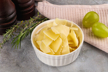 Parmesan cheese slices in the bowl