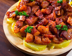 Spanish dish - roasted pig nose and cheeks
