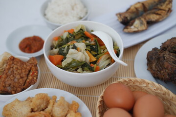 traditional Indonesian food arranged neatly on a table surface