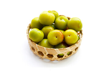 Fresh green plum on white background