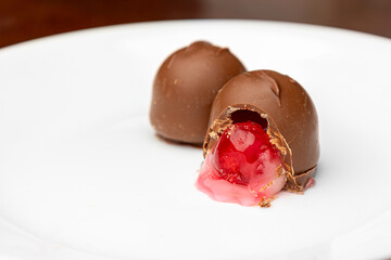 Milk Chocolate Cordial Cherries on a White Plate