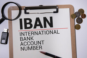 this photo features wooden dice spelling IBAN, perfect for financial articles, banking education...