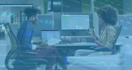 Image of financial data processing over diverse business people in office